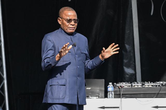 Cameroonian leader of the main opposition Movement for the Renaissance of Cameroon (MRC) and presidential candidate Maurice Kamto delivers a speech before thousands of people gathered for a political meeting six months ahead of the presidential election in Cameroon, on the Place de la Republique square in Paris on May 31, 2025. (Photo by Hugo MATHY / AFP)
