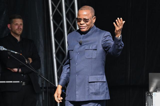 Cameroonian leader of the main opposition Movement for the Renaissance of Cameroon (MRC) and presidential candidate Maurice Kamto delivers a speech before thousands of people gathered for a political meeting six months ahead of the presidential election in Cameroon, on the Place de la Republique square in Paris on May 31, 2025. (Photo by Hugo MATHY / AFP)