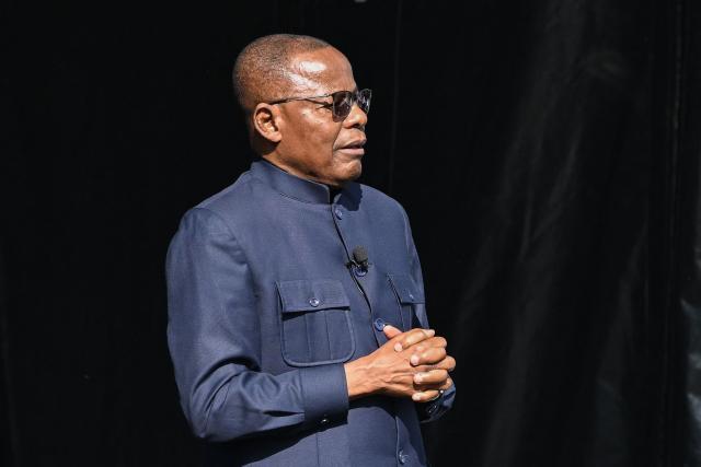 Cameroonian leader of the main opposition Movement for the Renaissance of Cameroon (MRC) and presidential candidate Maurice Kamto delivers a speech before thousands of people gathered for a political meeting six months ahead of the presidential election in Cameroon, on the Place de la Republique square in Paris on May 31, 2025. (Photo by Hugo MATHY / AFP)