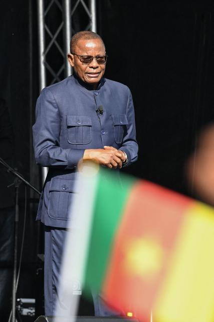 Cameroonian leader of the main opposition Movement for the Renaissance of Cameroon (MRC) and presidential candidate Maurice Kamto delivers a speech before thousands of people gathered for a political meeting six months ahead of the presidential election in Cameroon, on the Place de la Republique square in Paris on May 31, 2025. (Photo by Hugo MATHY / AFP)
