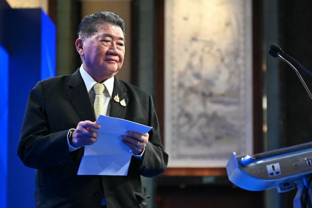 Thailand's Minister of Defence Phumtham Wechayachai prepares to deliver a speech during the fifth plenary session at the Shangri-La Dialogue Summit in Singapore on June 1, 2025. (Photo by MOHD RASFAN / AFP)