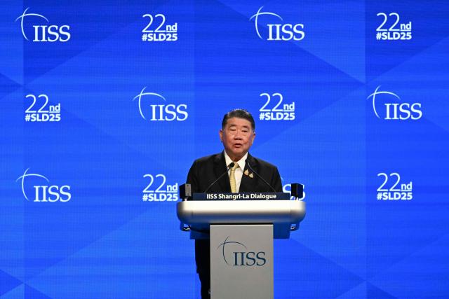 Thailand's Minister of Defence Phumtham Wechayachai delivers a speech during the fifth plenary session at the Shangri-La Dialogue Summit in Singapore on June 1, 2025. (Photo by MOHD RASFAN / AFP)