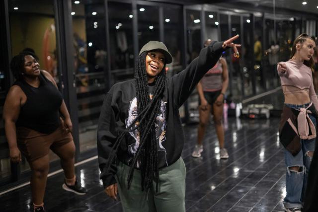 (FILES) Dancer and choreographer Bontle Moloi, also known as Bontle Modiselle, (C) dances during an amapiano class at her dance studio in Johannesburg, on June 1, 2023. (Photo by Michele Spatari / AFP)