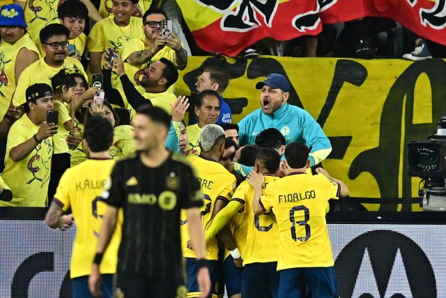 Club America's players celebrate their team's first goal from the penalty spot during a play-in match between LAFC and Club America for the final spot in the 2025 FIFA Club World Cup, at BMO Stadium in Los Angeles, California, on May 31, 2025. (Photo by Frederic J. BROWN / AFP)