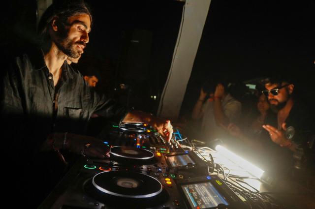 Youth from across Iraq and several European countries take part in in the Oceanic Avalanche Electronic Music Festival on top of the Haibat Sultan Mountain in the town of Koye (Koysinjaq), east of Arbil, the capital of the autonomous Kurdish region of northern Iraq, on May 31, 2025. (Photo by Safin HAMID / AFP)