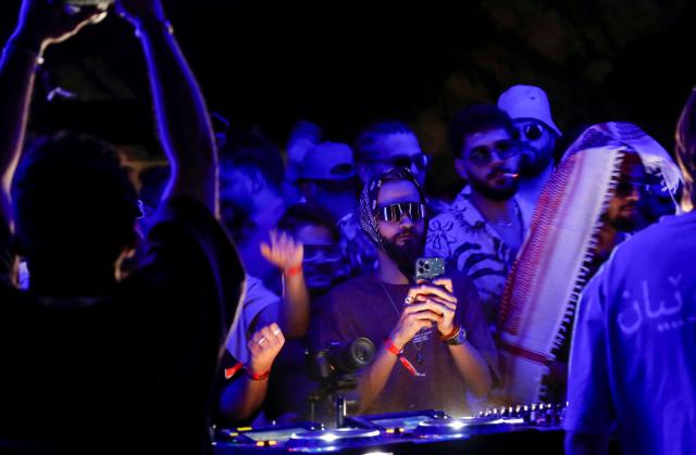 Youth from across Iraq and several European countries take part in in the Oceanic Avalanche Electronic Music Festival on top of the Haibat Sultan Mountain in the town of Koye (Koysinjaq), east of Arbil, the capital of the autonomous Kurdish region of northern Iraq, on May 31, 2025. (Photo by Safin HAMID / AFP)