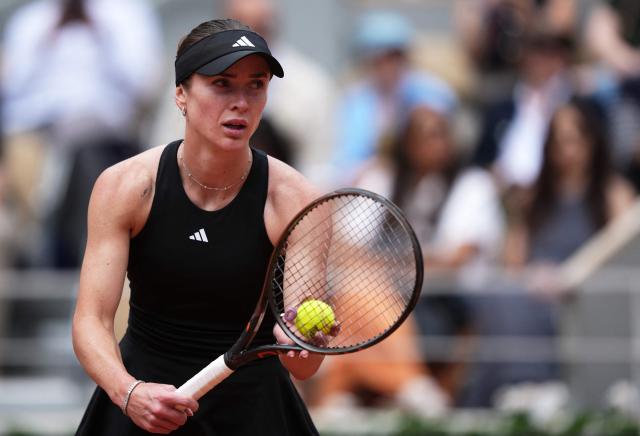 Ukraine's Elina Svitolina serves to Italy's Jasmine Paolini during their women's singles match on day 8 of the French Open tennis tournament on Court Philippe-Chatrier at the Roland-Garros Complex in Paris on June 1, 2025. (Photo by Dimitar DILKOFF / AFP)