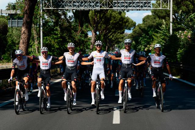 UAE Team Emirates XRG's Mexican rider Isaac Del Toro (3rd R) wearing the best young rider's white jersey (Maglia Bianca) reacts flanked by teammates during the 21st and last stage of the 108th Giro d'Italia cycling race of 143kms from Rome to Rome on June 1, 2025. (Photo by Luca Bettini / AFP)