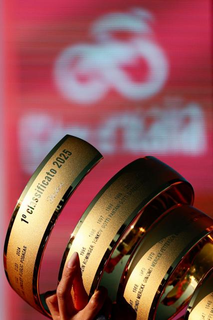 This photograph shows the Trofeo Senza Fine at the end of the 21st and last stage of the 108th Giro d'Italia cycling race of 143kms from Rome to Rome on June 1, 2025. (Photo by Luca Bettini / AFP)