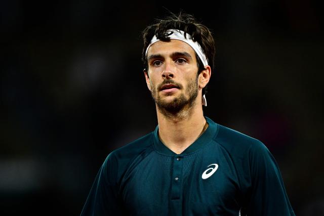 Italy's Lorenzo Musetti looks on during his men's singles match against Denmark's Holger Rune on day 8 of the French Open tennis tournament on Court Philippe-Chatrier at the Roland-Garros Complex in Paris on June 1, 2025. (Photo by JULIEN DE ROSA / AFP)