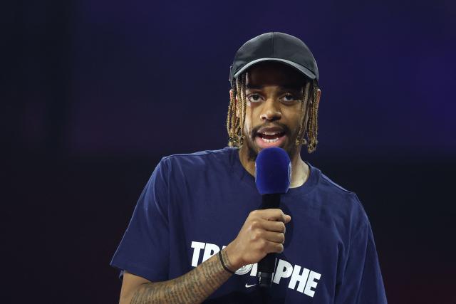 Paris Saint-Germain's French forward #29 Bradley Barcola speaks during a ceremony to present the trophy a day after Paris Saint-Germain (PSG) football club won the UEFA Champions League, at the Parc des Princes Stadium in Paris on June 1, 2025. (Photo by FRANCK FIFE / AFP)