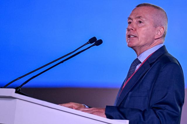 Willie Walsh, Director General of the International Air Transport Association (IATA), speaks during the IATA annual general meeting and World Air Transport Summit (WATS) in New Delhi on June 2, 2025. Walsh, addressing IATA delegates, called for the aviation sector to be spared from increased tariffs -- though he did not name US President Donald Trump, who launched a trade war in early April. (Photo by Money SHARMA / AFP)