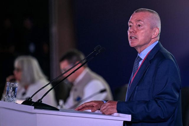 Willie Walsh, Director General of the International Air Transport Association (IATA), speaks during the IATA annual general meeting and World Air Transport Summit (WATS) in New Delhi on June 2, 2025. Walsh, addressing IATA delegates, called for the aviation sector to be spared from increased tariffs -- though he did not name US President Donald Trump, who launched a trade war in early April. (Photo by Money SHARMA / AFP)