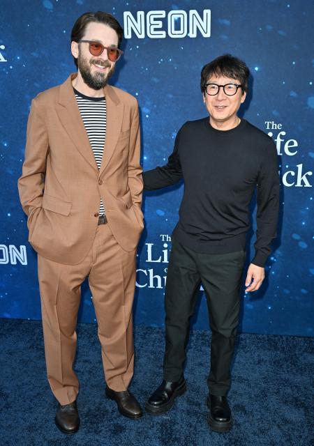 US-Vietnamese actor Ke Huy Quan (R) and producer Kevin Wright attend the US premiere of "The Life of Chuck" at the Hollywood Legion theatre in Los Angeles on June 2, 2025. (Photo by Robyn Beck / AFP)