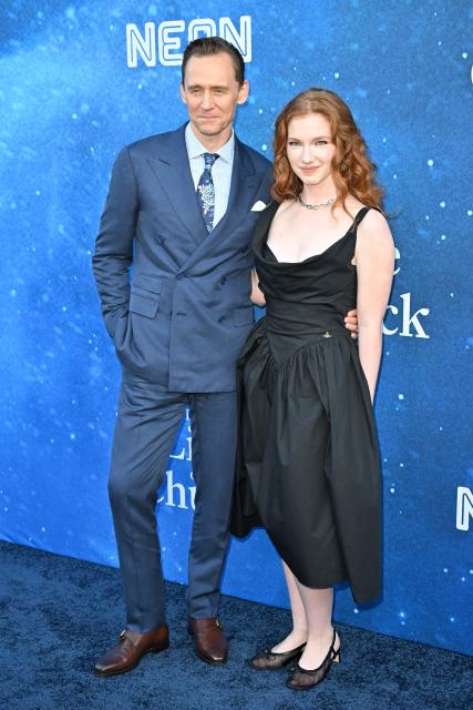 British actor Tom Hiddleston (R) and US actress Annalise Basso attend the US premiere of "The Life of Chuck" at the Hollywood Legion theatre in Los Angeles on June 2, 2025. (Photo by Robyn Beck / AFP)