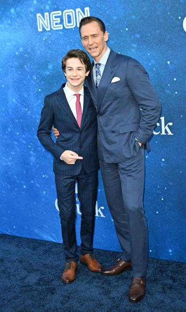 British actor Tom Hiddleston (R) and US actor Benjamin Pajak attend the US premiere of "The Life of Chuck" at the Hollywood Legion theatre in Los Angeles on June 2, 2025. (Photo by Robyn Beck / AFP)