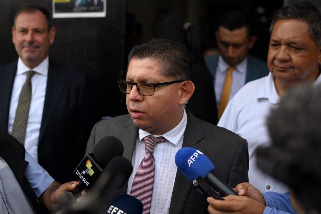 The plaintiff attorney Pedro Cruz speaks to the media as he leaves the Chalatenango Judicial Center in Chalatenango, El Salvador on June 3, 2025. A former defense minister and two colonels went on trial in El Salvador Tuesday for the killings of four Dutch journalists 43 years ago, an NGO assisting the victims' families said. (Photo by Marvin RECINOS / AFP)