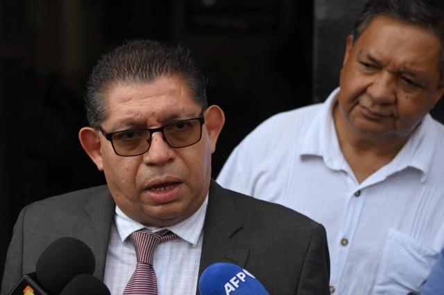 The plaintiff attorney Pedro Cruz speaks to the media as he leaves the Chalatenango Judicial Center in Chalatenango, El Salvador on June 3, 2025. A former defense minister and two colonels went on trial in El Salvador Tuesday for the killings of four Dutch journalists 43 years ago, an NGO assisting the victims' families said. (Photo by Marvin RECINOS / AFP)