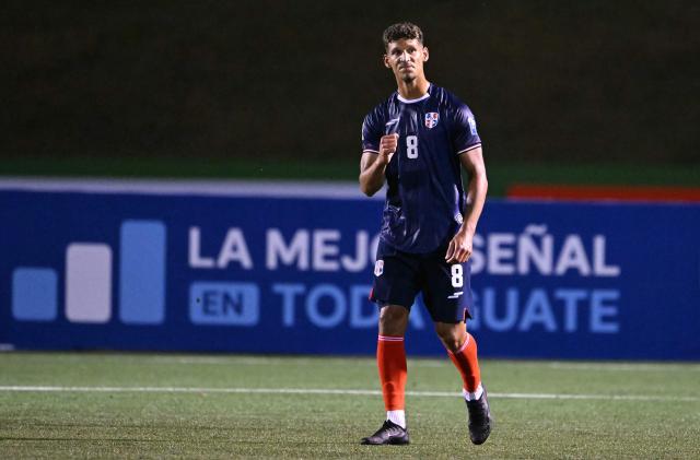 Dominican midfielder #08 Heinz Morschel celebrates after scoring during the 2026 FIFA World Cup Concacaf qualifier football match between Guatemala and Dominican Republic at the Cementos Progreso stadium in Guatemala city on June 6, 2025. (Photo by JOHAN ORDONEZ / AFP)