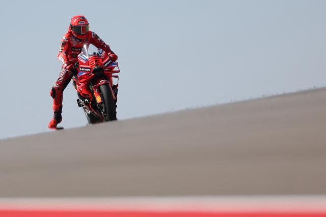 Ducati Lenovo Team's Spanish rider Marc Marquez rides during the free practice session of the MotoGP Aragon Grand Prix at the Motorland circuit in Alcaniz, northeastern Spain, on June 7, 2025. (Photo by LLUIS GENE / AFP)