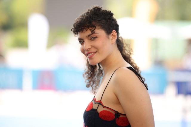 French actress Ava Baya poses during a photocall for the TV series "Soleil Noir" during the 64th Monte-Carlo Television Festival in Monaco on June 14, 2025. (Photo by Valery HACHE / AFP)