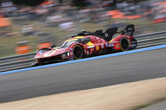 Ferrari AF Corse's Danish driver #50 Nicklas Nielsen steers his hypercar during the 2025 Le Mans 24 hour endurance race, at the Le Mans circuit, in north-western France on June 14, 2025. (Photo by JEAN-FRANCOIS MONIER / AFP)
