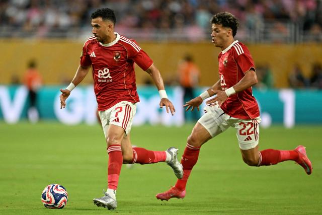 Al Ahly's Egyptian midfielder #07 Trezeguet controls the ball in front of Al Ahly's Egyptian midfielder #22 Emam Ashour during the Club World Cup 2025 Group A football match between Egypt's Al-Ahly and US Inter Miami at the Hard Rock stadium in Miami on June 14, 2025. (Photo by PATRICIA DE MELO MOREIRA / AFP)