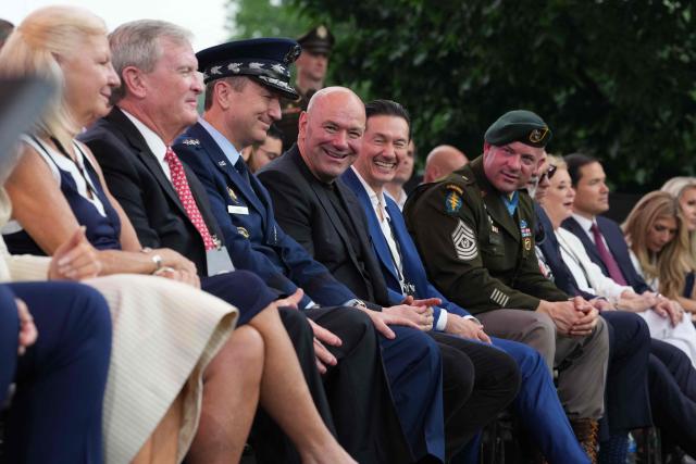 CEO of Ultimate Fighting Championship (UFC) Dana White (C) attends the Army 250th Anniversary Parade in Washington, DC on June 14, 2025. Trump's long-held dream of a parade will come true as nearly 7,000 troops plus dozens of tanks and helicopters rumble through the capital in an event officially marking the 250th anniversary of the US army. (Photo by Doug MILLS / POOL / AFP)