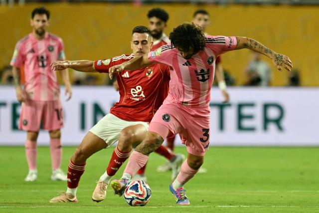 Al Ahly's Slovenian forward #10 Nejc Gradisar and Inter Miami's Uruguayan defender #37 Maximiliano Falcon fight for the ball during the Club World Cup 2025 Group A football match between Egypt's Al-Ahly and US Inter Miami at the Hard Rock stadium in Miami on June 14, 2025. (Photo by CHANDAN KHANNA / AFP)