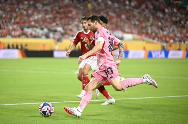Inter Miami's Argentine forward #10 Lionel Messi runs for the ball during the Club World Cup 2025 Group A football match between Egypt's Al-Ahly and US Inter Miami at the Hard Rock stadium in Miami on June 14, 2025. (Photo by PATRICIA DE MELO MOREIRA / AFP)