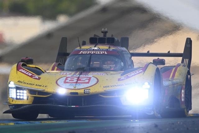 Ferrari AF Corse Thor Team's hypercar #83 British  driver Philipe Hanson competes during the 2025 Le Mans 24 hour endurance race, at the Le Mans circuit, in northwestern France, on June 15, 2025. (Photo by JEAN-FRANCOIS MONIER / AFP)