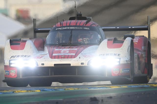 Porsche Penske Motorsport Thor Team's hypercar #06 Belgian driver Laurens Vanthoor competes during the 2025 Le Mans 24 hour endurance race, at the Le Mans circuit, in northwestern France, on June 15, 2025. (Photo by JEAN-FRANCOIS MONIER / AFP)