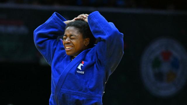 France's Sarah Leonie Cysique celebrates winning the women's -57kg bronze match of the Judo World Championships at the Papp Laszlo Arena in Budapest, Hungary on June 15, 2025. (Photo by Attila KISBENEDEK / AFP)