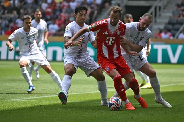 Auckland City's New Zealander defender #05 Nikko Boxall (front L) and Auckland City's New Zealander forward Michael Den Heijer (R) fight for the ball with Bayern Munich's English forward #09 Harry Kane (2ndR) during the Club World Cup 2025 Group C football match between Germany's Bayern Munich and New Zealand's Auckland City at the TQL stadium in Cincinnati on June 15, 2025. (Photo by Paul ELLIS / AFP)