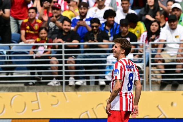 Atletico Madrid's Spanish midfielder #08 Pablo Barrios celebrates scoring his team's third goal during the FIFA Club World Cup 2025 Group B football match between US Seattle Sounders and Spain's Atletico de Madrid at the Lumen Field stadium in Seattle on June 19, 2025. (Photo by Pablo PORCIUNCULA / AFP)
