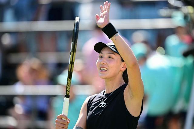 China's Wang Xinyu celebrates winning the semi-final match at the WTA tennis tournament in Berlin on June 21, 2025. (Photo by Tobias SCHWARZ / AFP)