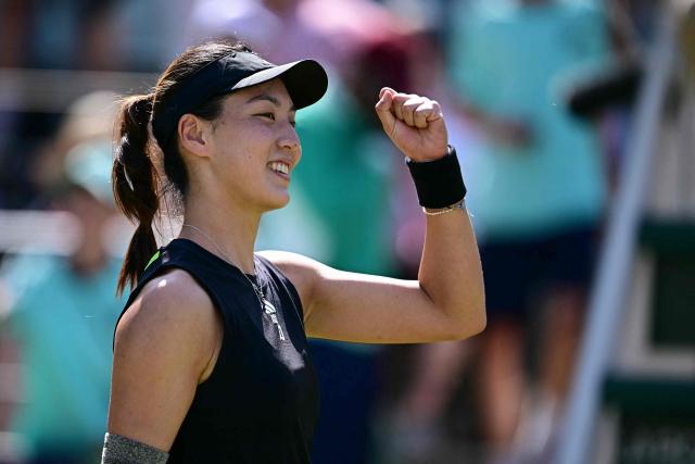 China's Wang Xinyu celebrates winning the semi-final match at the WTA tennis tournament in Berlin on June 21, 2025. (Photo by Tobias SCHWARZ / AFP)