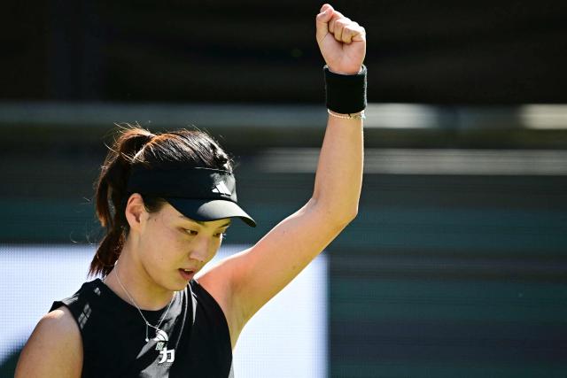 China's Wang Xinyu celebrates winning the semi-final match at the WTA tennis tournament in Berlin on June 21, 2025. (Photo by Tobias SCHWARZ / AFP)