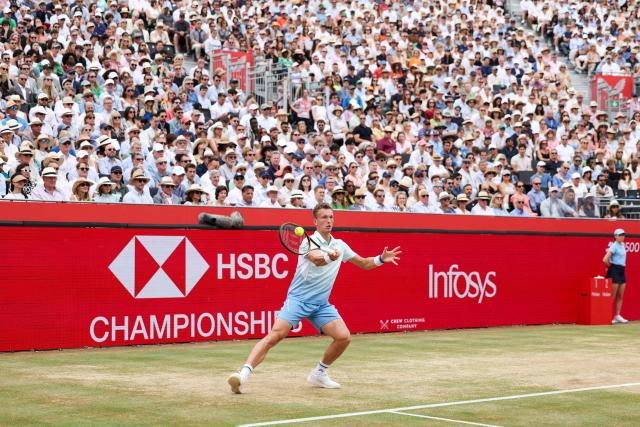 Czech Republic's Jiri Lehecka plays a forehand return to Spain's Carlos Alcaraz during their men's singles final tennis match at the HSBC ATP tennis Championships at Queen's Club in west London on June 22, 2025. (Photo by Adrian Dennis / AFP)