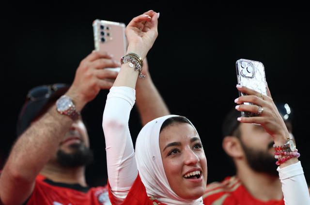 A fan of Al-Ahly smiles ahead of the FIFA Club World Cup 2025 Group A football match between Portugal's Porto FC and Egypt's Al-Ahly at the MetLife stadium in East Rutherford, New Jersey on June 23, 2025. (Photo by FRANCK FIFE / AFP)
