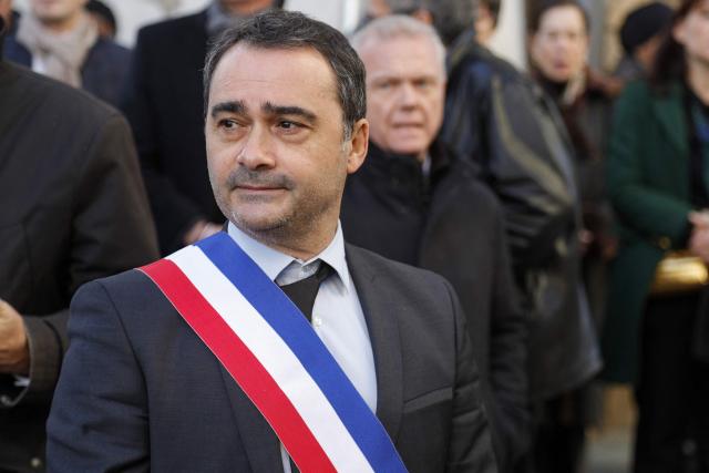 (FILES) Ajaccio's mayor Stephane Sbraggia stands prior to the commemoration of the anniversary of the murder of Prefect Claude Erignac in Ajaccio on the French Mediterranean island of Corsica on January 6, 2023. The mayor of Ajaccio, Stéphane Sbraggia, was briefly taken into police custody on June 25, 2025, as part of a preliminary investigation into breach of trust, according to the Bastia public prosecutor and Ajaccio town hall. (Photo by Pascal POCHARD-CASABIANCA / AFP)