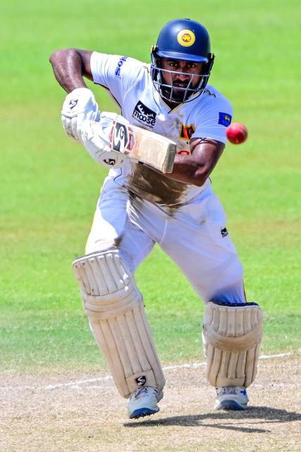 Sri Lanka's Kamindu Mendis plays a shot during the third day of the second Test cricket match between Sri Lanka and Bangladesh at the Sinhalese Sports Club (SSC) in Colombo on June 27, 2025. (Photo by Ishara S. KODIKARA / AFP)