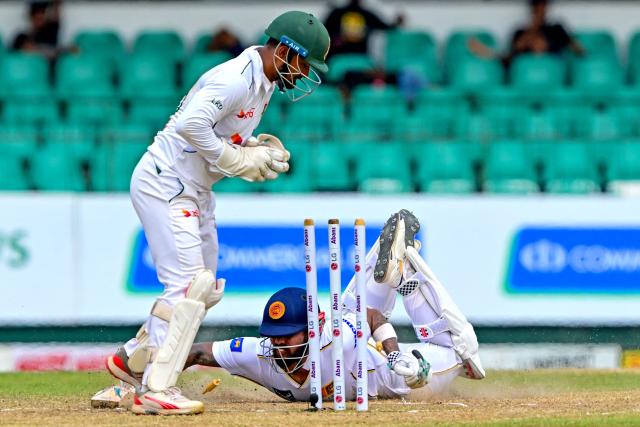 Bangladesh's wicketkeeper Litton Das stumps out Sri Lanka's Kusal Mendis during the third day of the second Test cricket match between Sri Lanka and Bangladesh at the Sinhalese Sports Club (SSC) in Colombo on June 27, 2025. (Photo by Ishara S. KODIKARA / AFP)