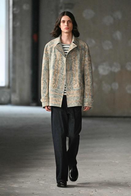 A model presents a creation by Junya Watanabe Man for the Menswear Ready-to-wear Spring-Summer 2026 collection as part of the Paris Fashion Week in Paris, on June 27, 2025. (Photo by EMMA DA SILVA / AFP)