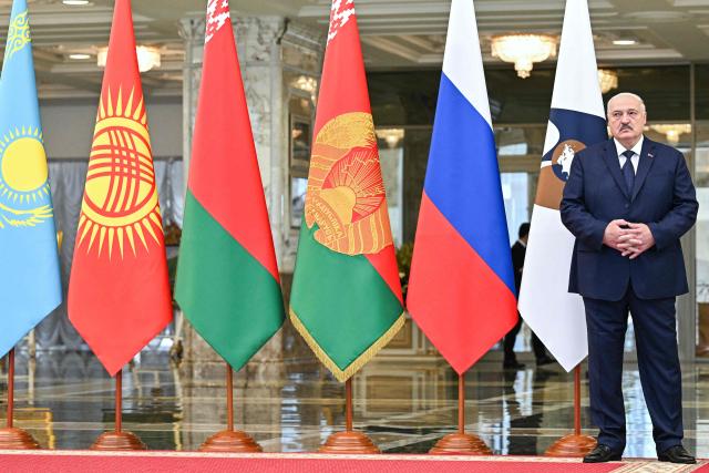 In this pool photograph distributed by the Russian state agency Sputnik, Belarusian President Alexander Lukashenko is seen prior to a meeting of the Supreme Eurasian Economic Council at the Independence Palace in Minsk on June 27, 2025. (Photo by Sergei BOBYLYOV / POOL / AFP)
