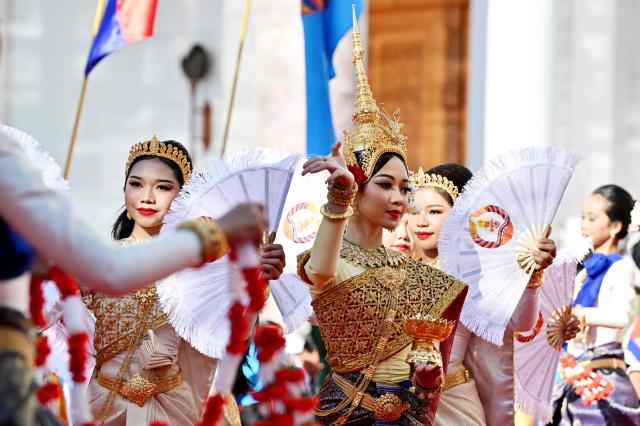 Dancers from a fine arts school perform during a ceremony marking the 74th founding anniversary of the Cambodian People’s Party (CPP) in Phnom Penh on June 28, 2025. (Photo by TANG CHHIN Sothy / AFP)