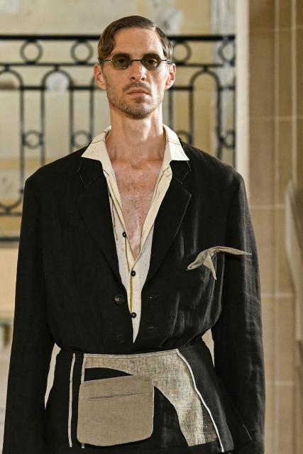 A model presents a creation for the Ziggy Chen's Menswear Spring-Summer 2026 collection show as part of the Paris Fashion Week in Paris, on June 28, 2025. (Photo by Bertrand GUAY / AFP)