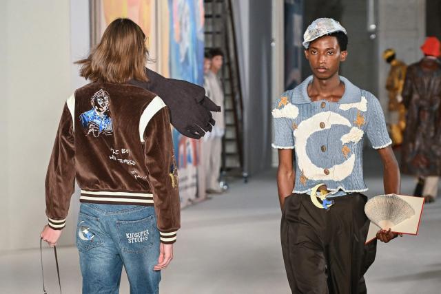 TOPSHOT - A model presentS a creation for KidSuper Menswear Spring-Summer 2026 collection show as part of the Paris Fashion Week in Paris, on June 28, 2025. (Photo by Bertrand GUAY / AFP)