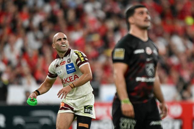 Bordeaux-Begles' French scrum-half Maxime Lucu scores a conversion during the French Top 14 rugby union final match between the Stade Toulousain (Toulouse) and Union Bordeaux-Begles (UBB) at the Stade de France stadium in Saint-Denis, north of Paris, on June 28, 2025. (Photo by Julie SEBADELHA / AFP)