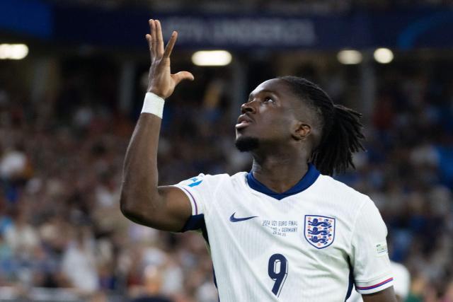 England's forward #09 Jonathan Rowe celebrates after scoring the 3-2 goal during the UEFA U21 European Championship final football match between England and Germany in Bratislava, Slovakia on June 28, 2025. (Photo by TOMAS BENEDIKOVIC / AFP)